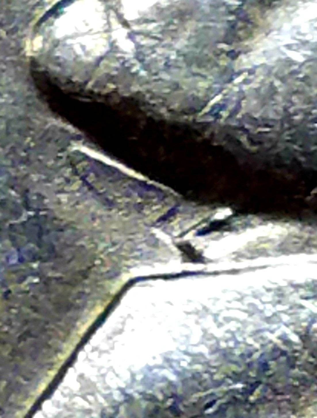 1976-D-Jefferson-Nickel-Tilted-Die-Strike-Under-Jaw-On-Obverse?